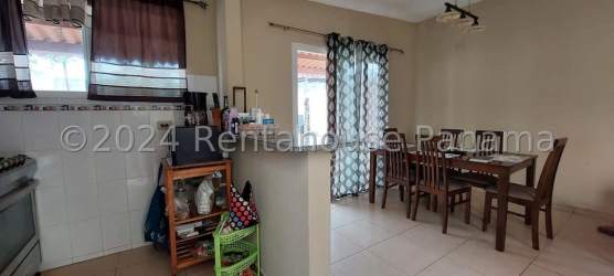 Contemporary tiled bathroom with shower toilet and sink in house for sale Arboleda Los Olivos