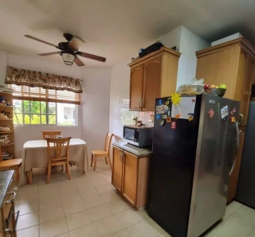 Living room with built-in bar, wine rack, leather sofas Costa del Este Panama