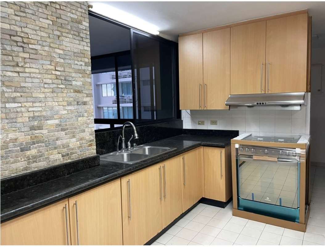 Curved balcony with glass railing and stunning ocean city view at PH Crillon Punta Pacifica Panama City