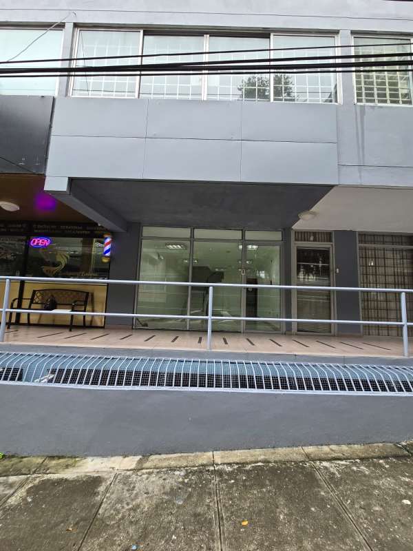 Modern commercial retail space with glass facade and accessible ramp Via Argentina Panama