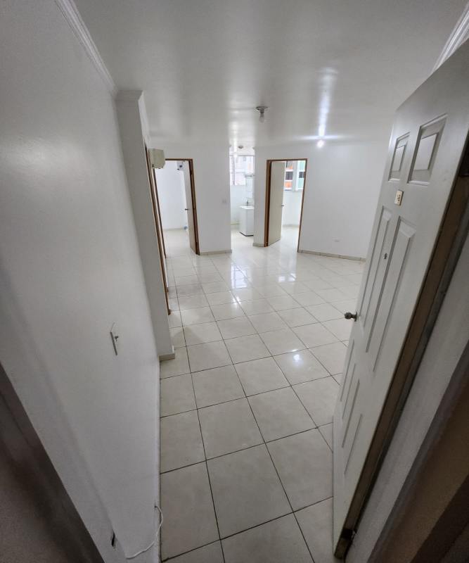 Hallway with tiled floors connecting apartment rooms in PH Llano Bonito Panama