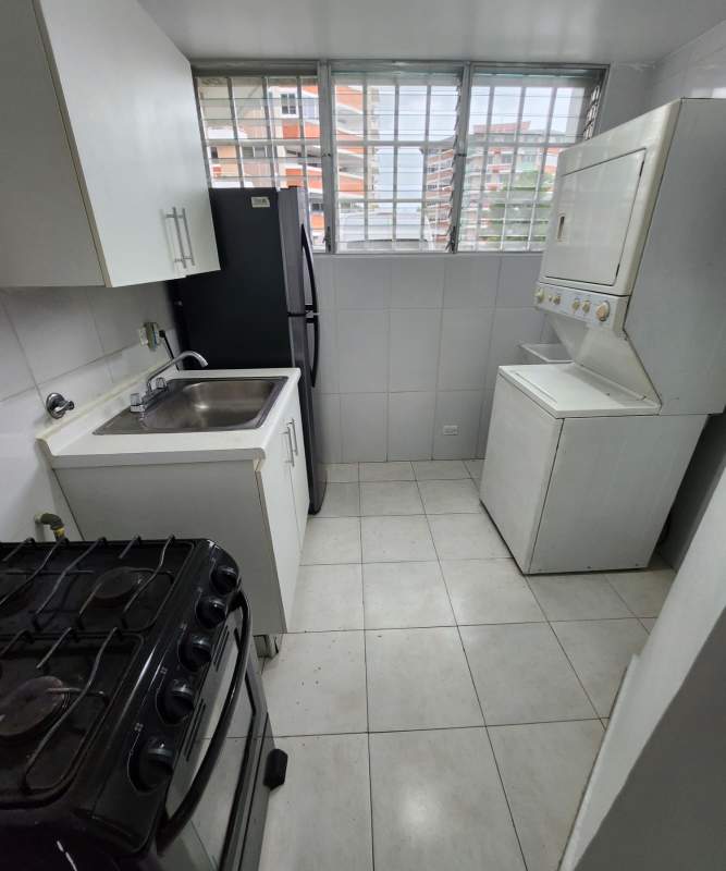 Kitchen and laundry area apartment for sale PH Llano Bonito Panama City affordable unit