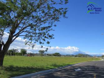 Open field with mountain backdrop and blue sky perfect for residential build Volcán Chiriquí