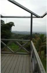Elevated steel frame country cabin construction site with nature views Panama