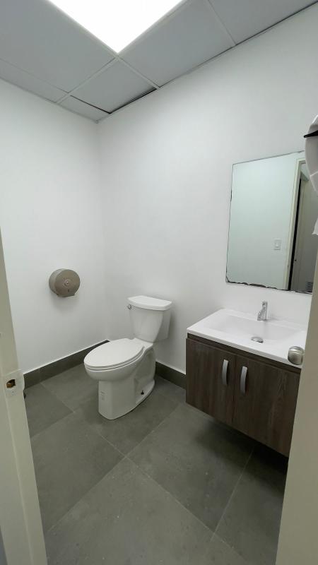 Minimalist bathroom with sink and toilet in Obarrio commercial rental space