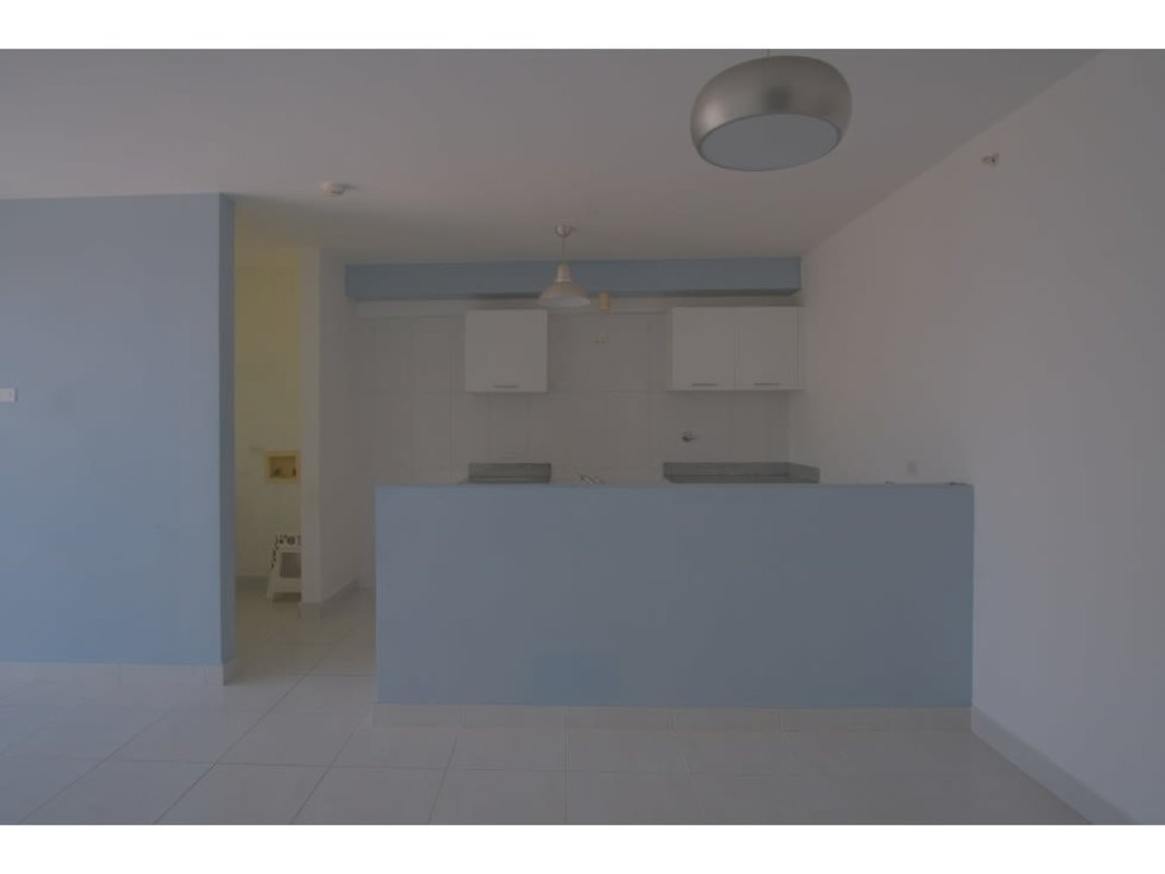 Open kitchen with bar and pendant lights PH Metropolitan Park Panama City