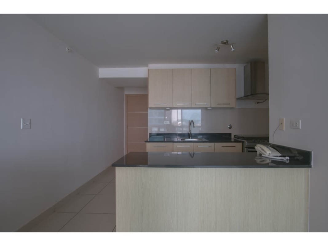 Modern apartment kitchen with granite countertops light cabinets PH Torres de Castilla Panama