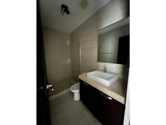 Modern bathroom with walk-in shower and vanity at PH Nativa house in Panama Pacifico