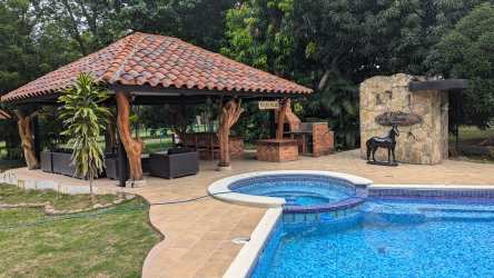 Luxury outdoor area with pool, BBQ, rustic finishes in Coronado Golf community Panama