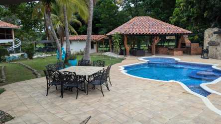 Private swimming pool with lounge terrace at golf home in Coronado Panama