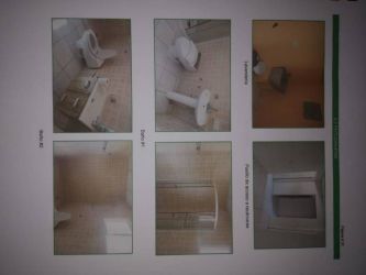 Bathroom view with shower, sink, toilet, neutral tiles Altos de Araguaney