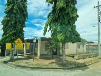 Single-story house corner lot with trees and front porch La Chorrera Panama