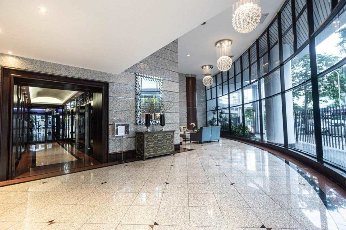 Remodeled kitchen with granite countertops green tile backsplash PH Los Delfines Panama City