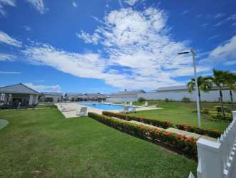 Outdoor swimming pool and gazebo in Playa Dorada Residences Vacamonte Panama