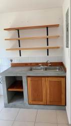 Playground with white fencing and turf in Playa Dorada community Vacamonte Panama