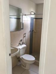 Compact modern bathroom with glass shower enclosure Playa Dorada Vacamonte Panam