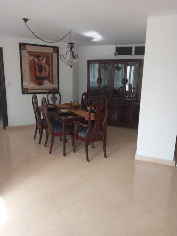 Kitchen with cabinetry and breakfast bar at PH Ultramar Plaza Marbella Panama