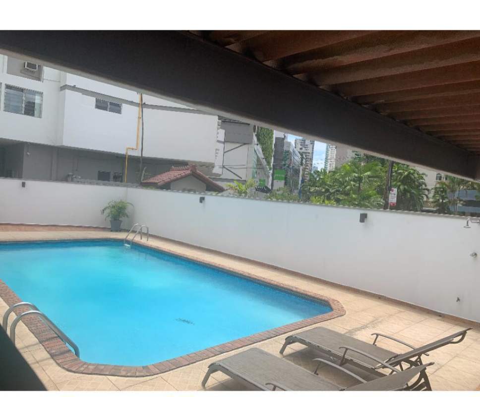 Outdoor pool and sundeck at PH Ultramar Plaza Marbella Panama City