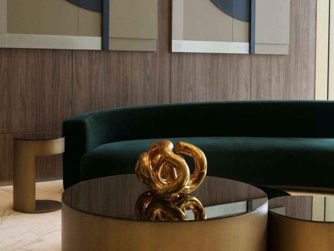 Modern luxury kitchen with marble island and integrated appliances at La Maison by Fendi Santa Maria Panama