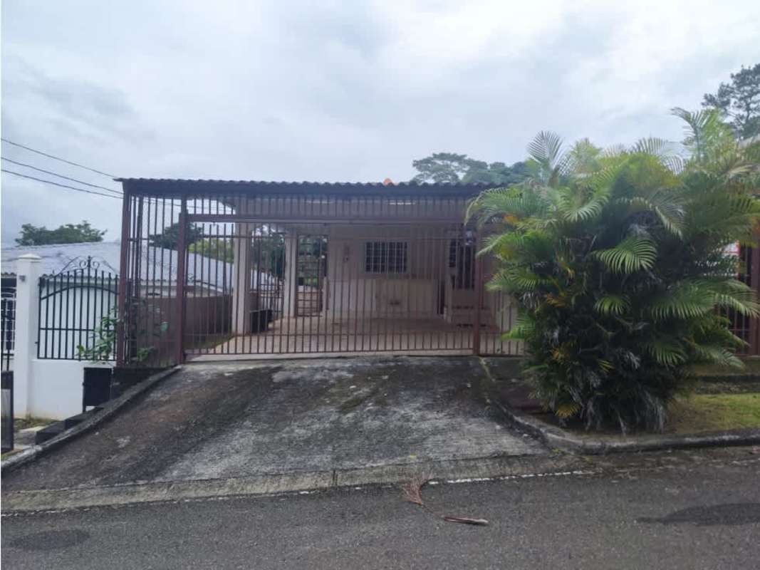 Gated driveway with secure entrance, covered carport at Villa Zaita Panama house for sale
