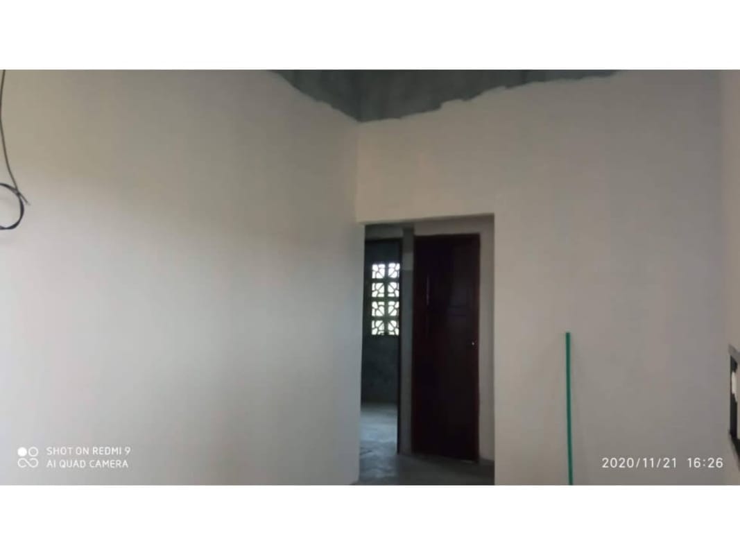 Unfinished room with concrete floor and white walls inside Chepo house for sale Hola Realty