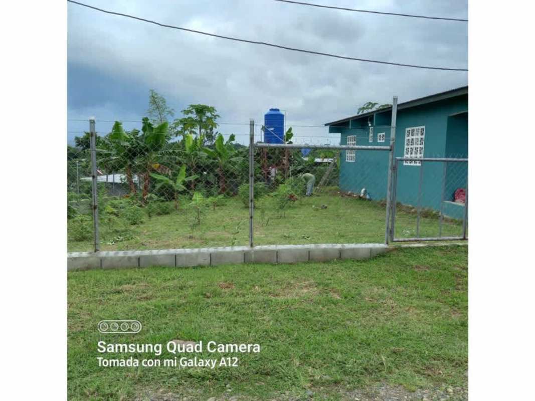 Fence banana plants water tank backyard of affordable house for sale Chepo Panama