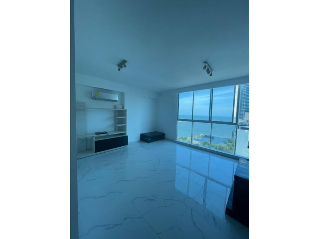 Bright modern unfurnished bedroom with marble tile split AC large window PH Pacific Sky Punta Pacifica