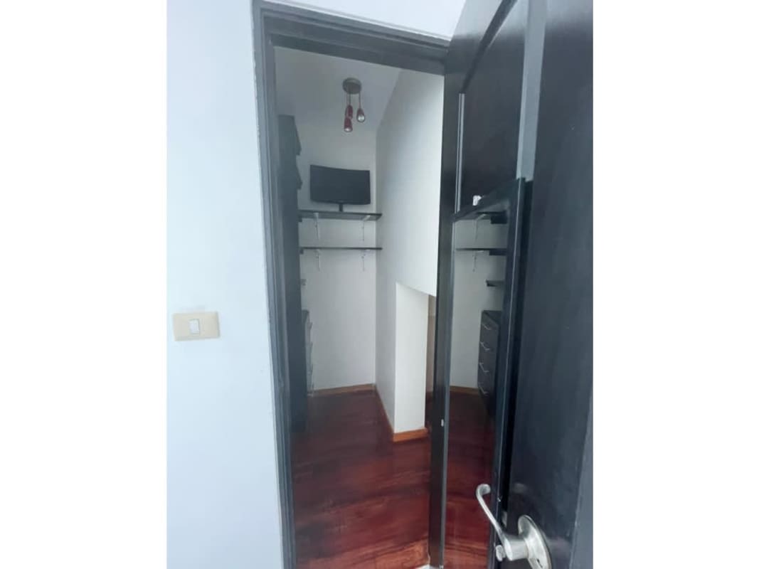 Spacious bathroom bathtub walk-in shower beige tiles minimalist PH Pacific Sky Punta Pacifica