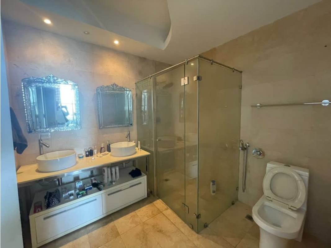 Elegant bathroom with double vanity glass shower PH Yoo Avenida Balboa