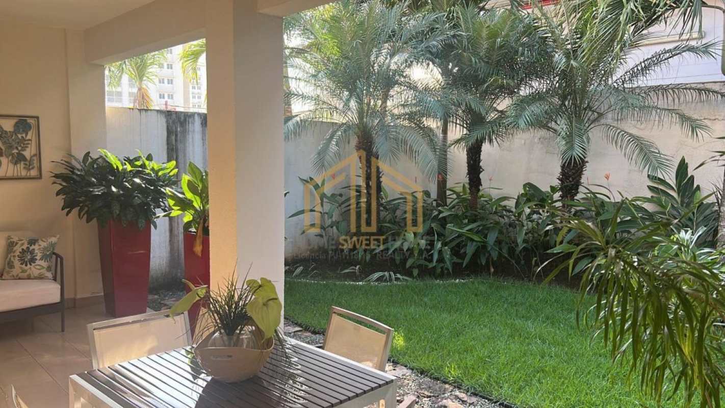 Dining room with porcelain floors and window overlooking garden Reserva de Versailles Costa Sur Panama