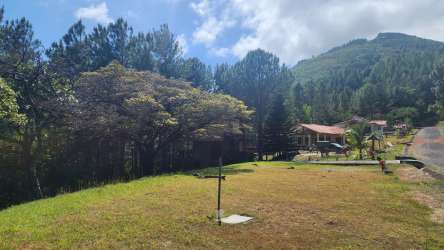 Residential mountain lot bordering paved road in Altos del María Sora Panama