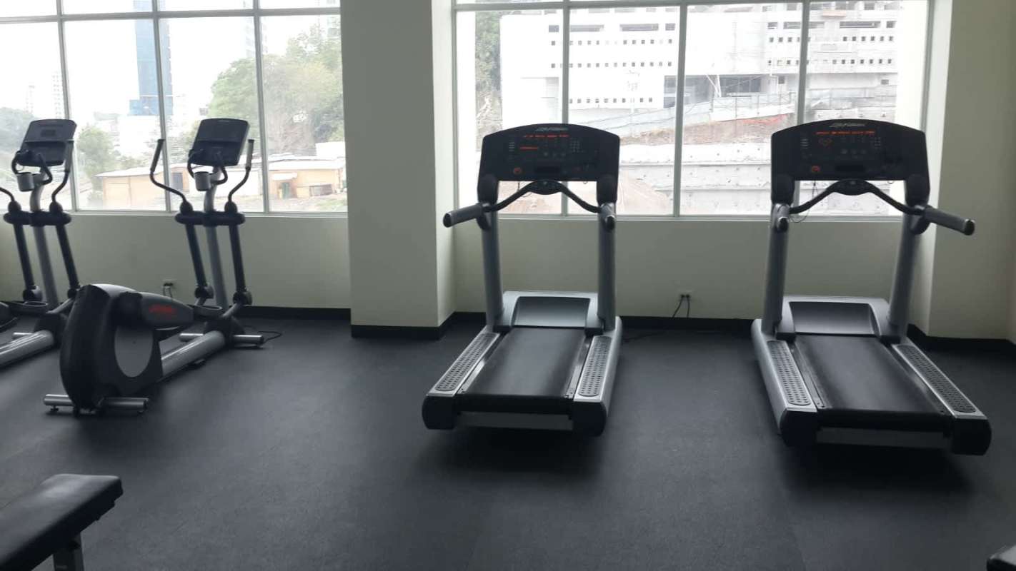 Contemporary dining area with workspace corner in Vivendi 300 Edison Park Panama City