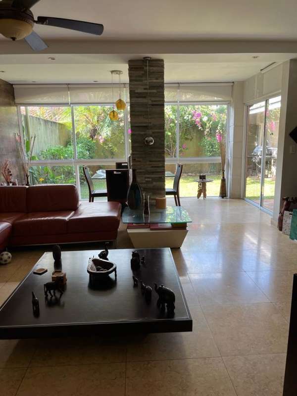 Spacious covered terrace patio overlooking garden in PH Quintas de Versalles Panama City