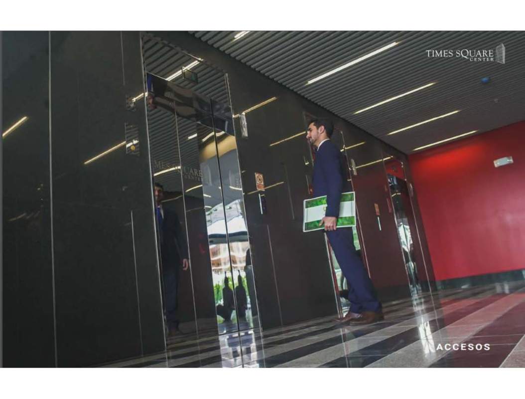 Modern elevator lobby with security access and stylish finishes at Time Square Center business tower Panama