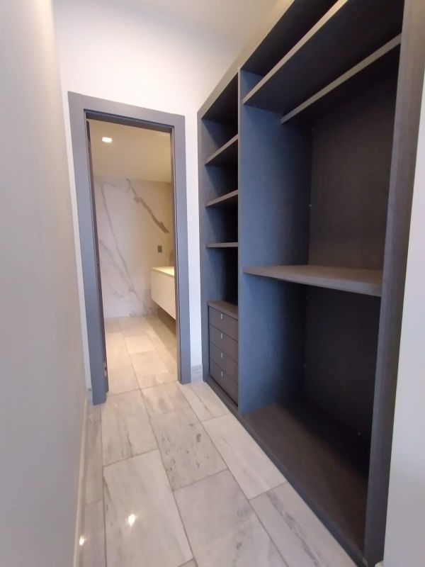 Bedroom with large window and ocean views in PH BICSA Financial Center Panama