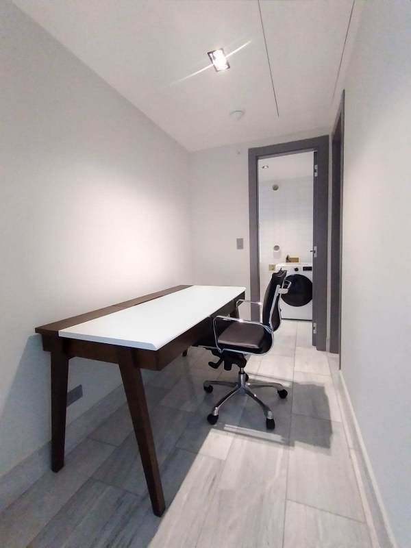 Modern gym with cardio and weights at PH BICSA Financial Center in Panama City