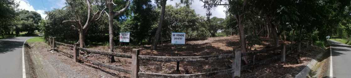 Road access with fence onto beach development land for sale Punta Barco San Carlos Panama
