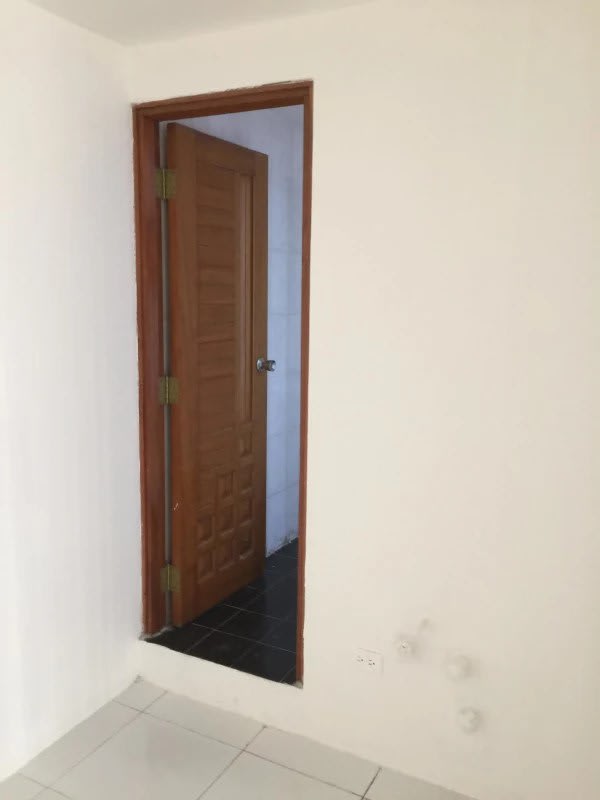 Modern hallway with curved glass block wall inside office for rent PH BAC Tower Avenida Balboa