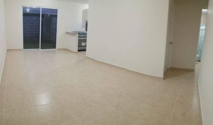 Compact kitchen featuring granite countertop and appliances La Arboleda Panama