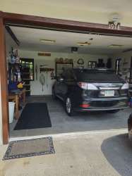 Kitchen wood cabinets appliances tile floor house Volcán Chiriquí Panama for sale