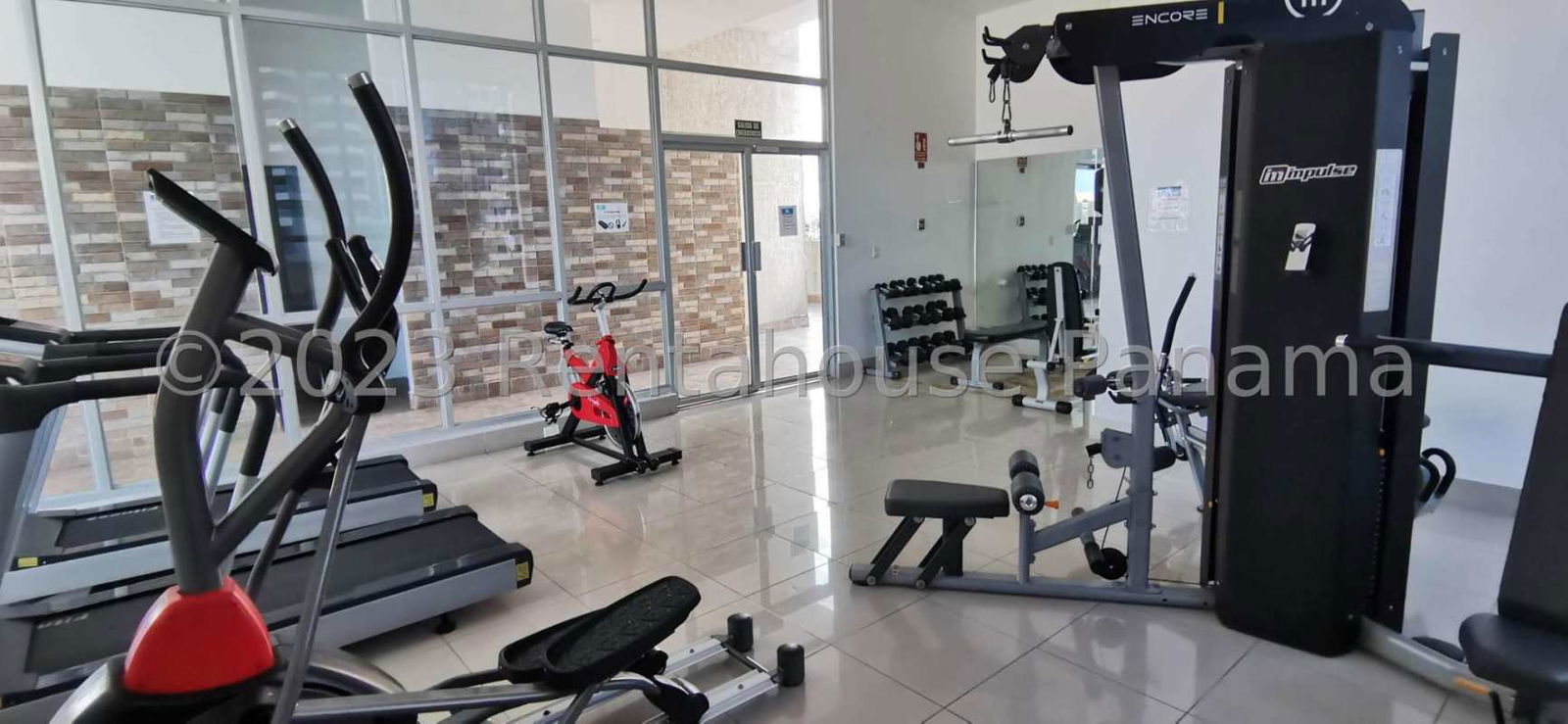 Colorful safe rooftop children's playground and covered terrace at PH Kolosal Panama City