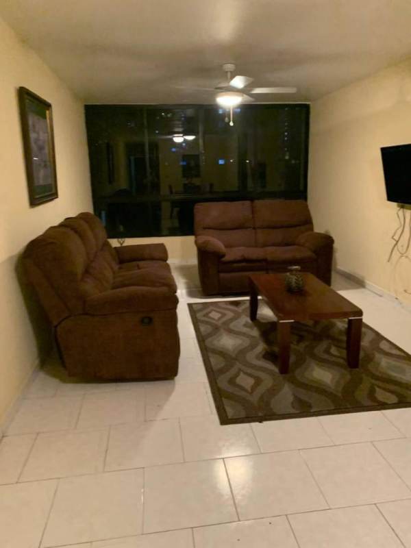 Open plan living dining room with AC and fan in PH El Cangrejo Plaza, Panama City