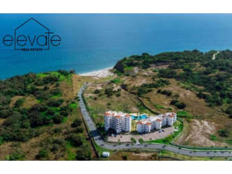 Private balcony with wooden railing overlooking Pacific Ocean Playa Caracol Punta Chame Panama