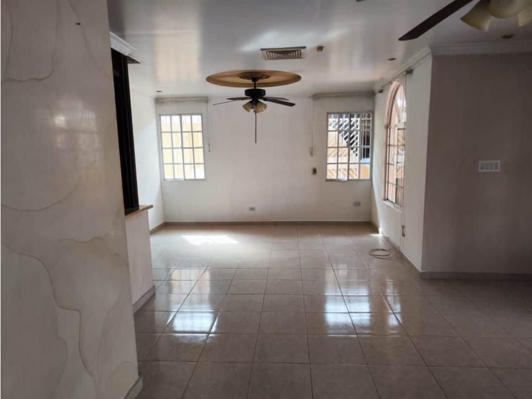 Bright living dining space with ceramic floors, ceiling fan, neutral colors in Rufina Alfaro Panama