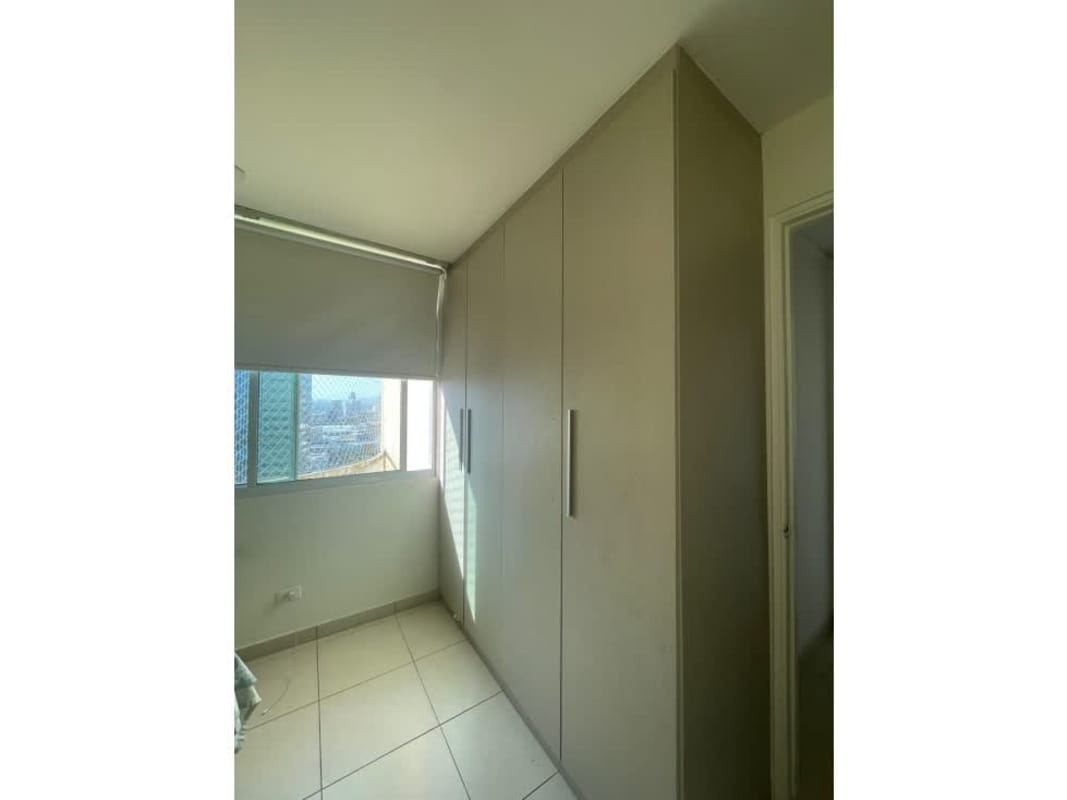 Stylish closed kitchen with cabinetry and gas stove PH Royal Pacific Punta Pacifica Panama City