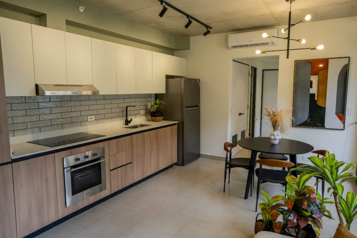 Second bathroom with modern finishes glass shower PH Begin CoLiving Brisas del Golf Panama