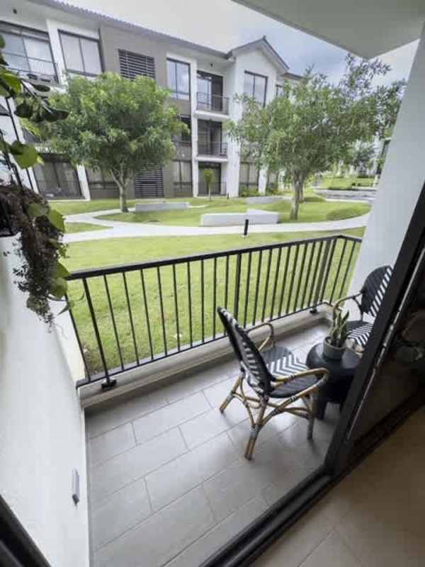 Exterior garden palm trees landscaped facade PH Begin CoLiving Brisas del Golf Panama