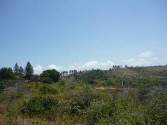 Expansive hillside land plot with natural vegetation rural Panama San Carlos