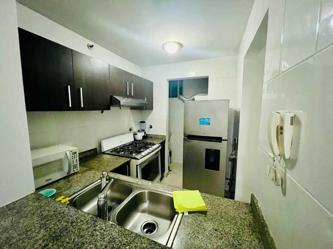 Spacious living room with floor-to-ceiling windows panoramic golf ocean views in PH Albatross Panama