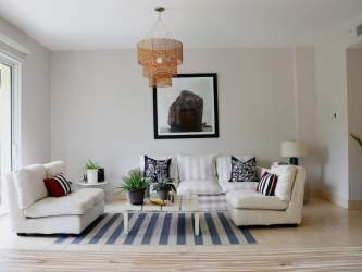Bright living room with white sofas natural light coastal decor in Puntarena Buenaventura Panama